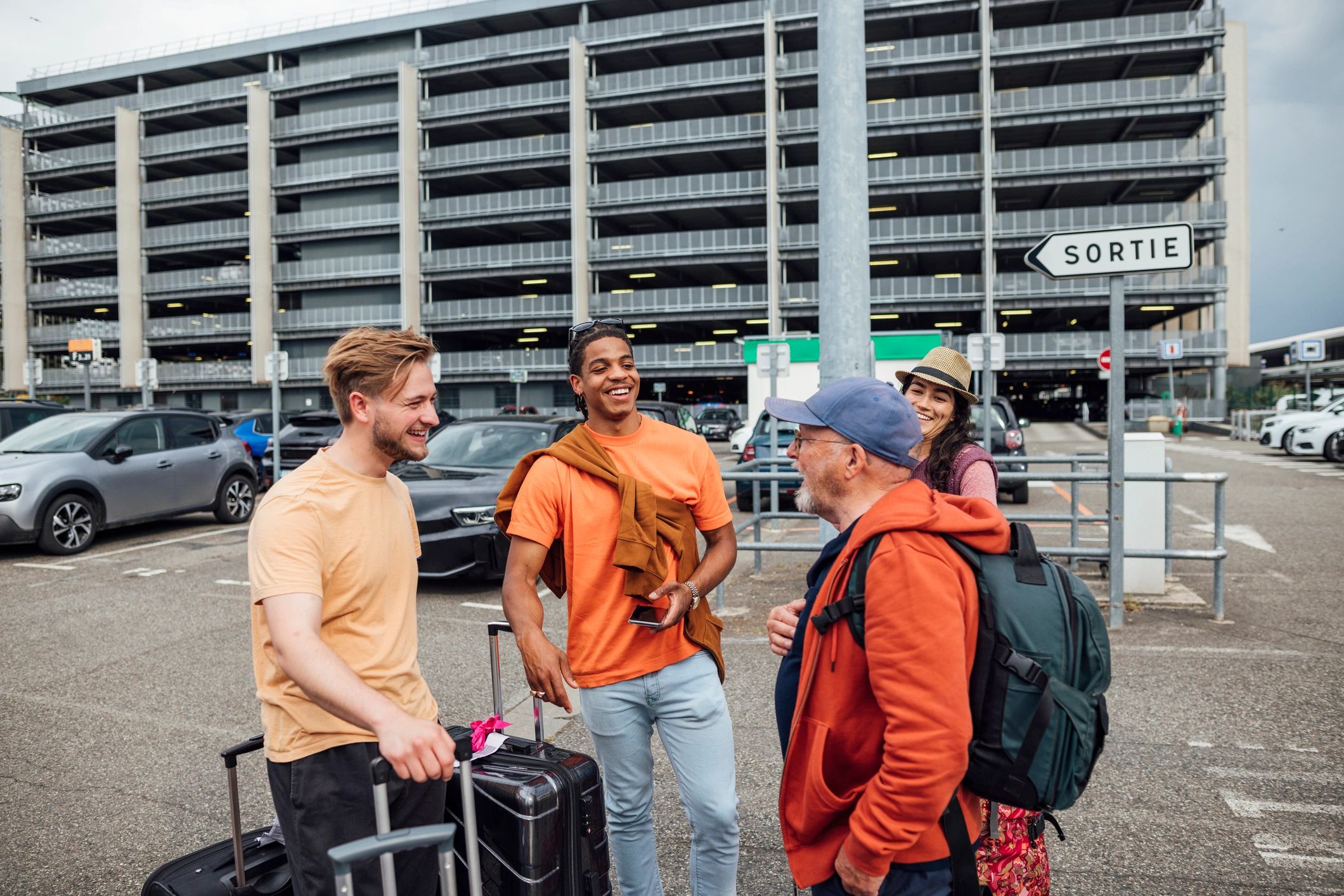 Older travelers preparing for a holiday near an airport