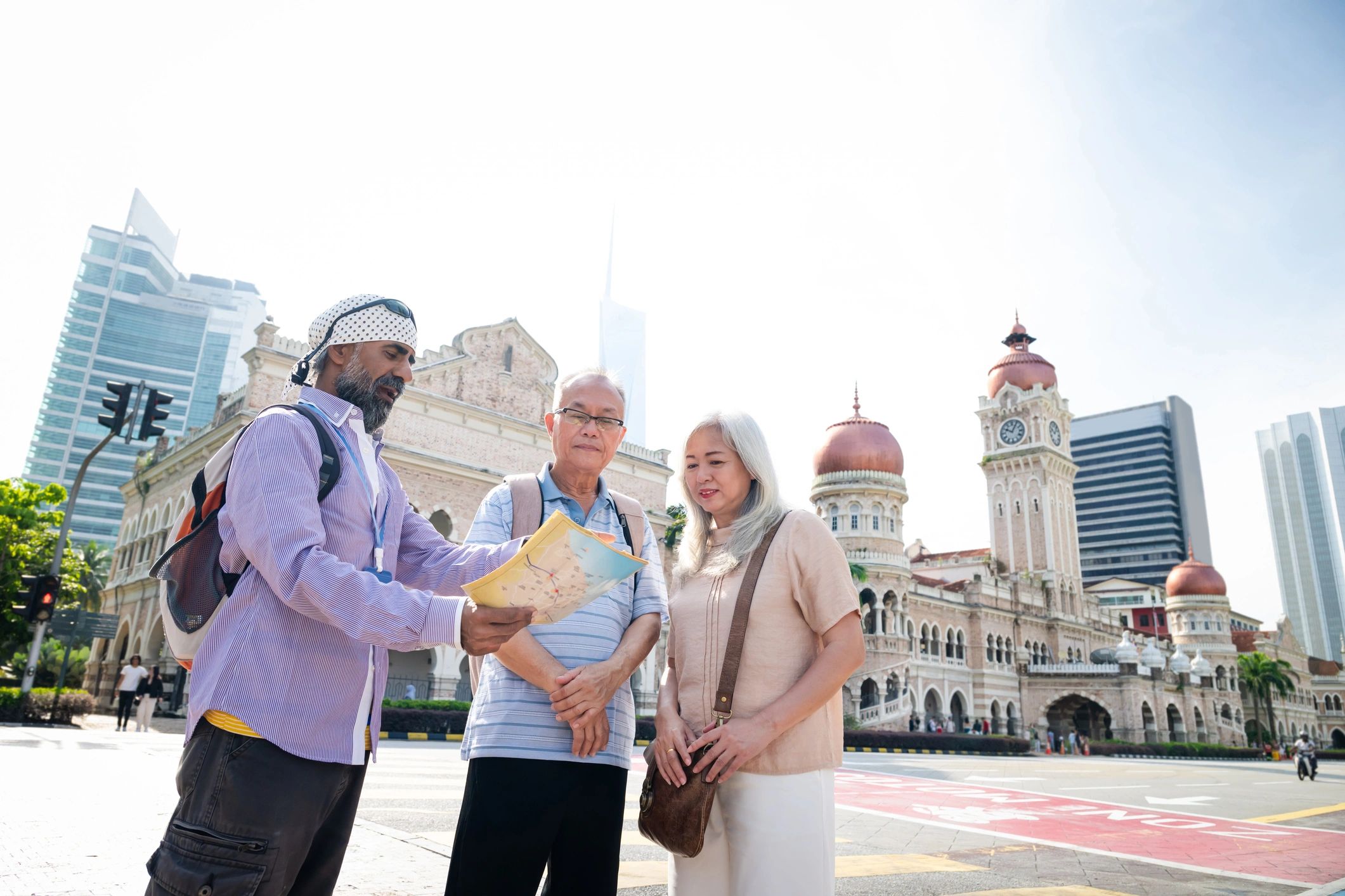 Senior travelers listening to destination guidance during a city visit